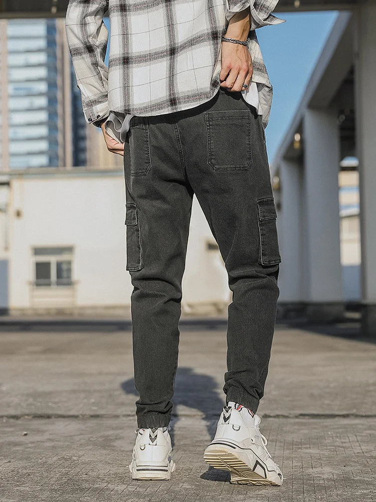 Spring Autumn Men's Jeans Multi-Pockets Work Wear Cargo Pants Black Blue Elastic Waist Denim Joggers Big Size Jean Trousers 8XL